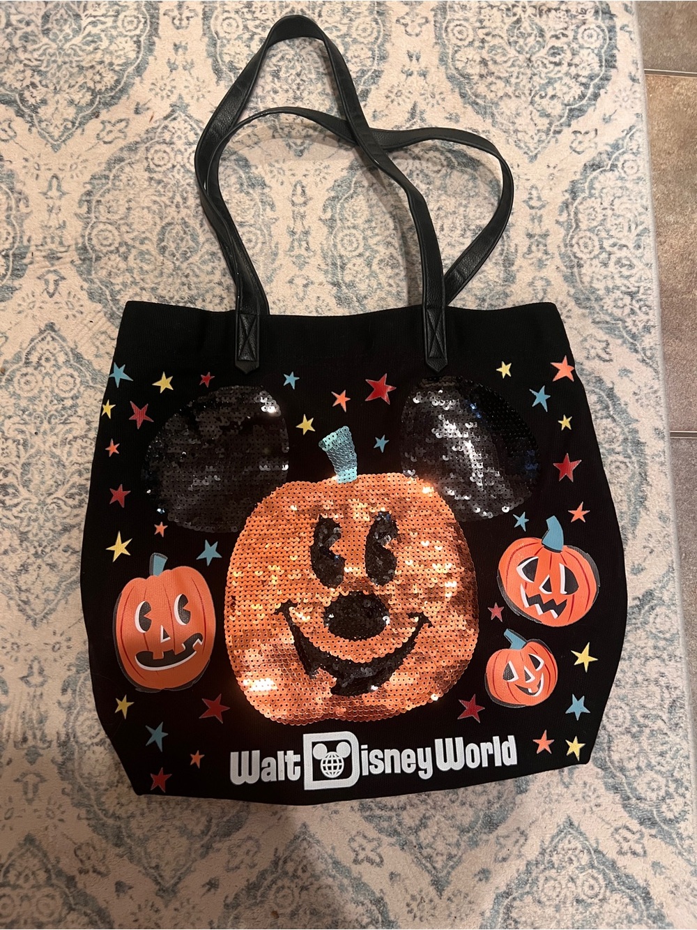 Disney black branded tote with logo tag